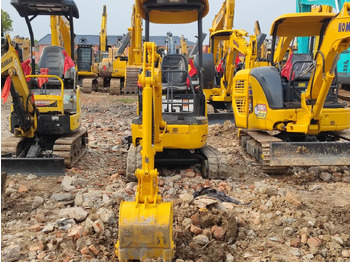 Minikotró Komatsu PC18MR: 4 kép.