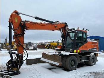 Gumikerekes kotró DOOSAN DX210