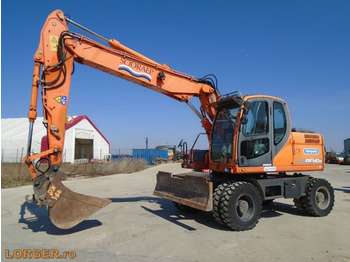 Gumikerekes kotró DOOSAN DX140W