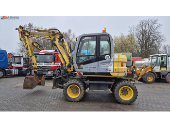 Gumikerekes kotró NEW HOLLAND