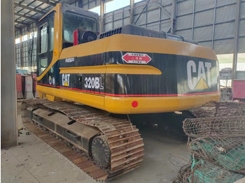 Lánctalpas kotró CATERPILLAR 320BL: 2 kép.