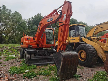 Gumikerekes kotró DOOSAN DH150W-7