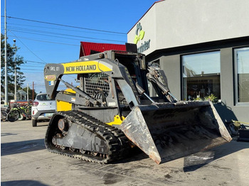 Kompakt lánctalpas rakodó New Holland C 185: 4 kép.