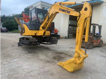 Minikotró Komatsu PC40MR: 5 kép.