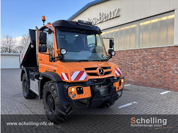 Billenőplatós teherautó UNIMOG