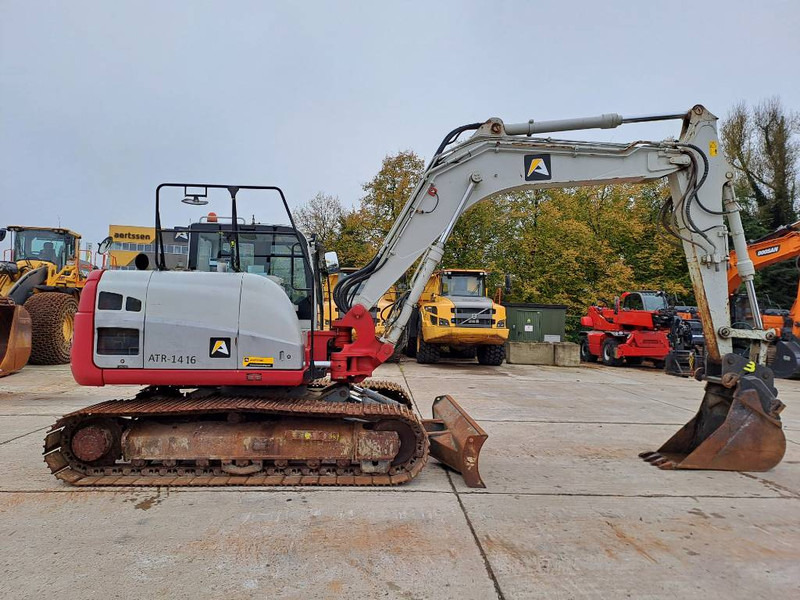 Lánctalpas kotró Takeuchi TB2150: 6 kép.