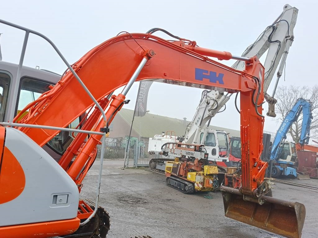 Lánctalpas kotró Fiat-Kobelco hitachi E165 rupskraan tracked excavator ketten ba: 22 kép.