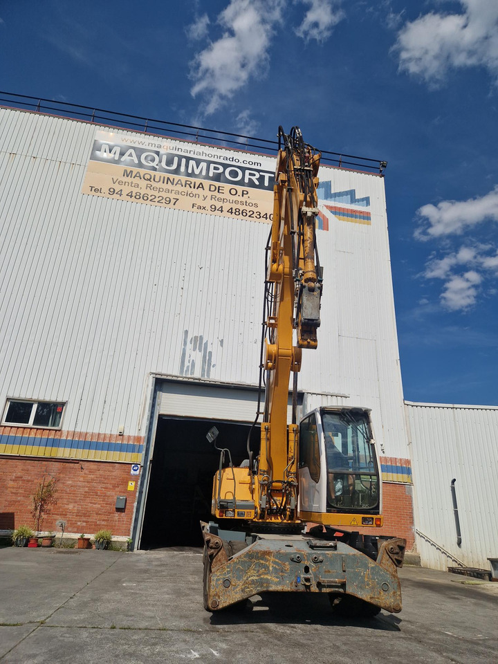 Hulladék kotró LIEBHERR A904C (2010): 7 kép.