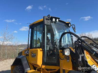 Gumikerekes homlokrakodó JCB 411 S5 HT Chargeuse Sur Pneus: 23 kép.