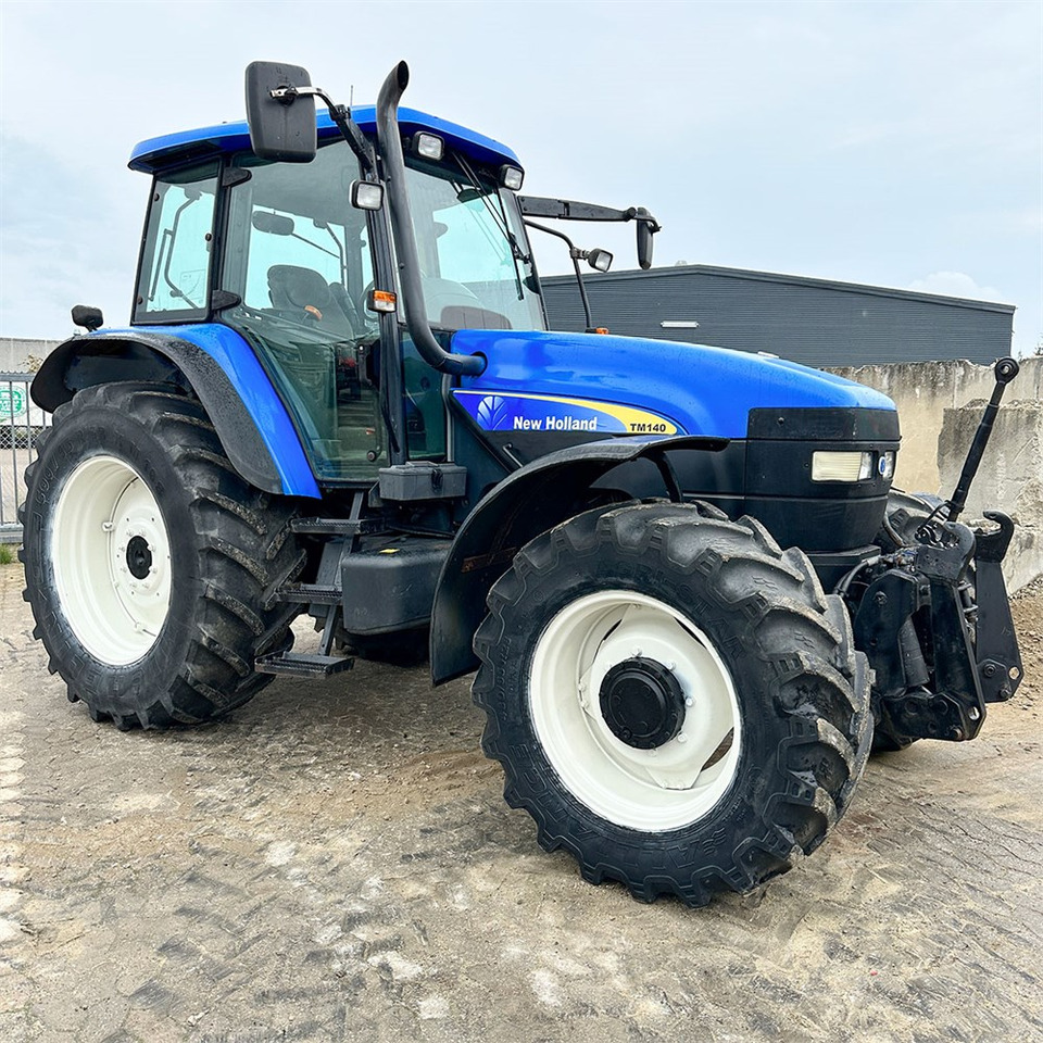 Traktor New Holland TM140: 8 kép.