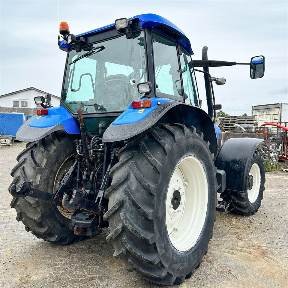 Traktor New Holland TM140: 6 kép.