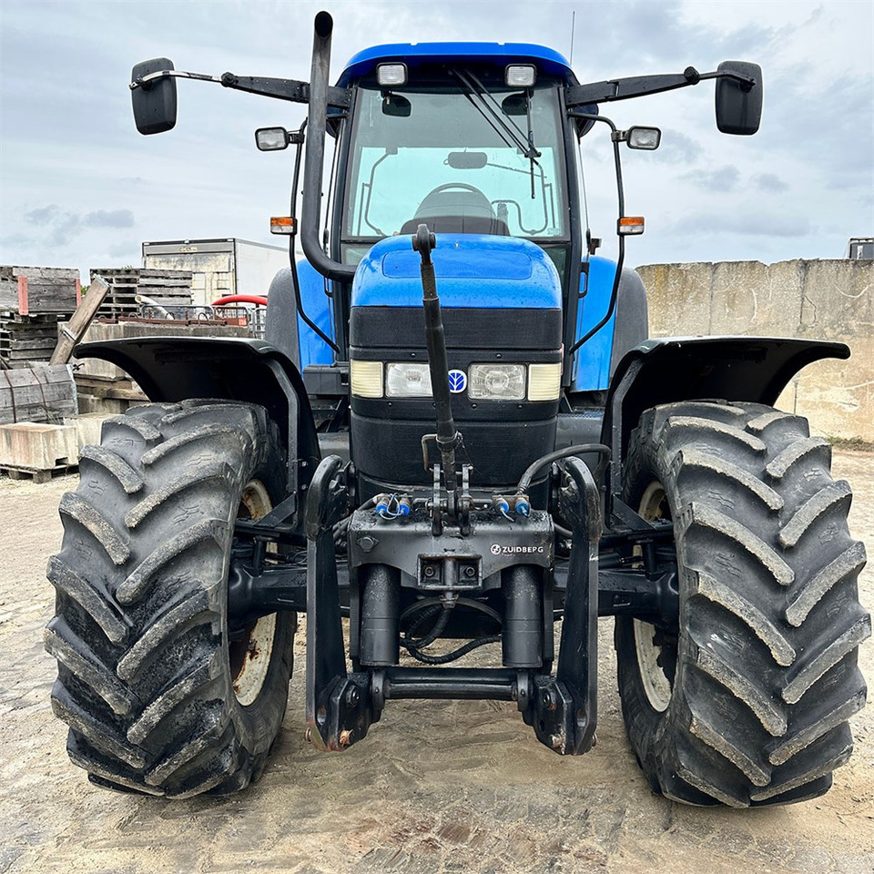 Traktor New Holland TM140: 9 kép.