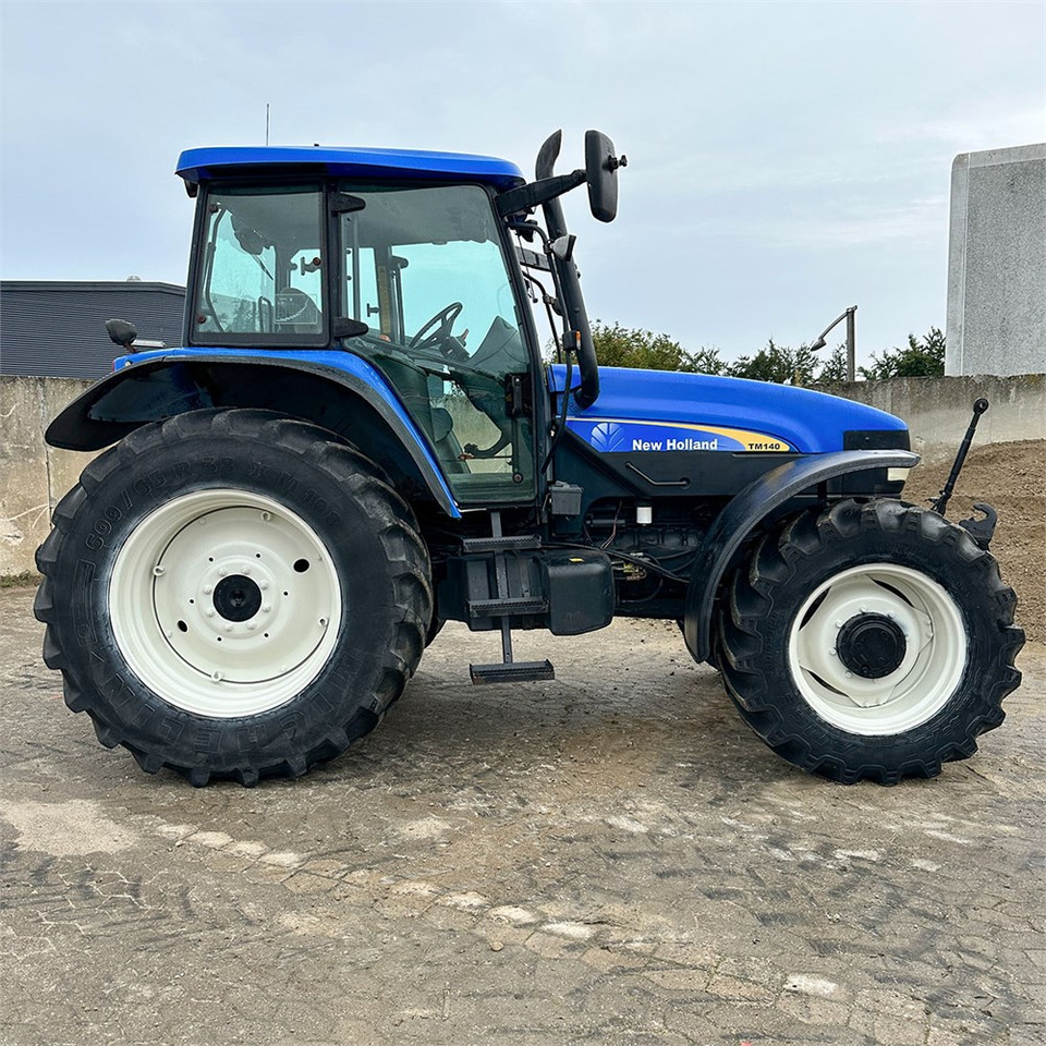 Traktor New Holland TM140: 7 kép.